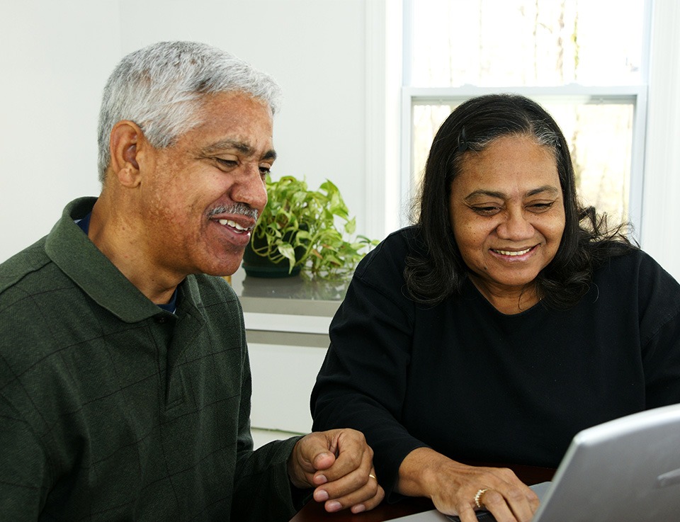 Senior couple review reverse mortgage options